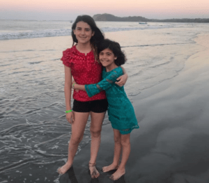Legacy Donor Alyssa Peterson and sister on the beach