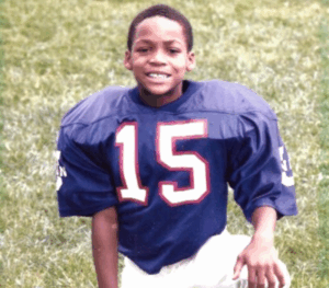 Legacy Donor Corey Davis in his Pop Warner football uniform
